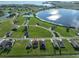 Aerial view showing home location in desirable neighborhood near lake at 485 Adams View Ln, Auburndale, FL 33823