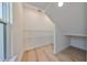 Bright storage room with wire shelving and hardwood floors at 485 Adams View Ln, Auburndale, FL 33823