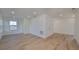 Spacious bedroom with wood floors, built-in storage and multiple windows at 485 Adams View Ln, Auburndale, FL 33823