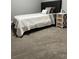 Cozy bedroom with carpeted floors and a twin-sized bed at 6945 Church Lake St, Groveland, FL 34736