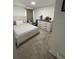 Comfortable bedroom with carpeted floor and a queen-sized bed at 6945 Church Lake St, Groveland, FL 34736