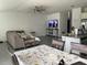 Open concept dining area with table and chairs, adjacent to kitchen at 6945 Church Lake St, Groveland, FL 34736