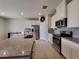 Kitchen with stainless steel appliances and granite countertops at 1564 Eucalyptus Way, Davenport, FL 33837