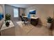 Home office with a desk, chair, and plants at 1564 Eucalyptus Way, Davenport, FL 33837