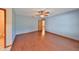 Bedroom with wood flooring and ceiling fan at 220 Coleman E Dr, Winter Haven, FL 33884