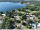 An aerial view of lakefront homes and properties at 220 Coleman E Dr, Winter Haven, FL 33884