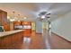 Kitchen with wood cabinets, granite counters, and stainless steel appliances at 220 Coleman E Dr, Winter Haven, FL 33884