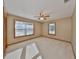 Bright bedroom with neutral walls and carpet flooring at 220 Coleman E Dr, Winter Haven, FL 33884
