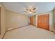 Bedroom with carpet flooring and ceiling fan at 220 Coleman E Dr, Winter Haven, FL 33884