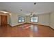 Bright living room with wood floors and lots of natural light at 220 Coleman E Dr, Winter Haven, FL 33884