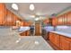 Spacious kitchen with granite countertops and stainless steel appliances at 220 Coleman E Dr, Winter Haven, FL 33884