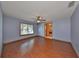 Spacious bedroom with wood flooring and ceiling fan at 220 Coleman E Dr, Winter Haven, FL 33884