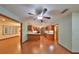 Open kitchen with wood cabinets and a view of the living area at 220 Coleman E Dr, Winter Haven, FL 33884