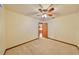 Bright bedroom with carpet flooring and ceiling fan at 220 Coleman E Dr, Winter Haven, FL 33884