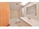 Clean bathroom with a bathtub, toilet and vanity at 220 Coleman E Dr, Winter Haven, FL 33884
