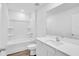 Clean bathroom with white cabinets and a bathtub at 4270 Sw 143Rd Lane Rd, Ocala, FL 34473