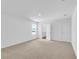 Spacious bedroom with neutral carpeting and ample natural light at 4270 Sw 143Rd Lane Rd, Ocala, FL 34473