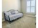 Cozy bedroom with a daybed, perfect for guests or a home office at 7771 Lake James Blvd, Lakeland, FL 33810