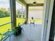 Spacious screened-in porch overlooking backyard at 7771 Lake James Blvd, Lakeland, FL 33810