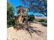 Relaxing stone fireplace in paved outdoor patio area at 5446 Pebble Beach Dr, Lakeland, FL 33812
