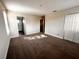 Spacious bedroom with carpeted floors and ample closet space at 210 Kenny Blvd, Haines City, FL 33844