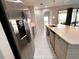 Modern kitchen with stainless steel appliances and an island at 210 Kenny Blvd, Haines City, FL 33844