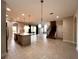 Open concept kitchen with island and stainless steel appliances at 210 Kenny Blvd, Haines City, FL 33844