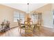 Formal dining room with wood floors and antique furniture at 3 Crescent Lake Way, Ormond Beach, FL 32174