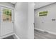 Laundry room with exterior access and vinyl flooring at 3419 Lisa Ln, Lakeland, FL 33801