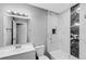 Modern bathroom with marble-tiled shower and vanity at 3419 Lisa Ln, Lakeland, FL 33801