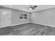 Spacious living room with hardwood floors and neutral walls at 3419 Lisa Ln, Lakeland, FL 33801