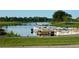 Several boats docked at a lakeside community at 7811 Red Grange Blvd, Indian Lake Estates, FL 33855