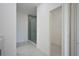 Bathroom with a large walk-in shower and separate room at 7811 Red Grange Blvd, Indian Lake Estates, FL 33855