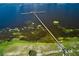 Aerial view of a large pier over water at 7811 Red Grange Blvd, Indian Lake Estates, FL 33855