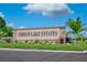 Community entrance sign for Indian Lake Estates at 7811 Red Grange Blvd, Indian Lake Estates, FL 33855