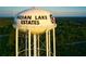 Aerial view of Indian Lake Estates water tower at 7811 Red Grange Blvd, Indian Lake Estates, FL 33855