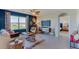 Spacious living area with access to the bedroom and lots of natural light at 140 Hickory Course Trl, Ocala, FL 34472