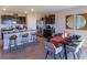 Modern kitchen with island, stainless steel appliances, and granite countertops at 140 Hickory Course Trl, Ocala, FL 34472