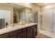 Double vanity bathroom with a shower and plenty of storage at 140 Hickory Course Trl, Ocala, FL 34472