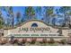 Lake Diamond community entrance sign with a water feature at 140 Hickory Course Trl, Ocala, FL 34472