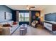 Bright living room with a view, comfortable seating, and stylish decor at 140 Hickory Course Trl, Ocala, FL 34472