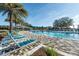 Resort-style pool with ample lounge chairs and shade structures at 4083 Nw 44Th Cir, Ocala, FL 34482