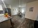 Bright dining area with table and chairs, hardwood floors at 319 Hibiscus Dr, Kissimmee, FL 34759