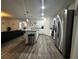 Modern kitchen with stainless steel appliances and island at 319 Hibiscus Dr, Kissimmee, FL 34759