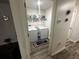 Laundry room with washer, dryer, and shelving at 319 Hibiscus Dr, Kissimmee, FL 34759