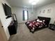 Spacious bedroom with a king-size bed and ample closet space at 319 Hibiscus Dr, Kissimmee, FL 34759