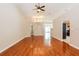 Bright living room with hardwood floors and high ceilings at 31817 Sunpark Cir, Leesburg, FL 34748