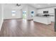 Open concept living area with kitchen and vinyl plank floors at 420 Marion Oaks Ln, Ocala, FL 34473