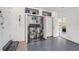 Convenient laundry room with washer, dryer, and ample storage at 1075 8Th Nw St, Winter Haven, FL 33881