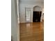 Living room with fireplace, hardwood floors, and patio access at 12031 Villanova Dr # 110, Orlando, FL 32837